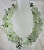 Prehnite memory wire bracelet with Celtic knot charm